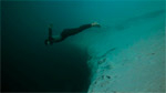 Guillaume Nery underwater base jump at Dean’s Blue Hole Photo