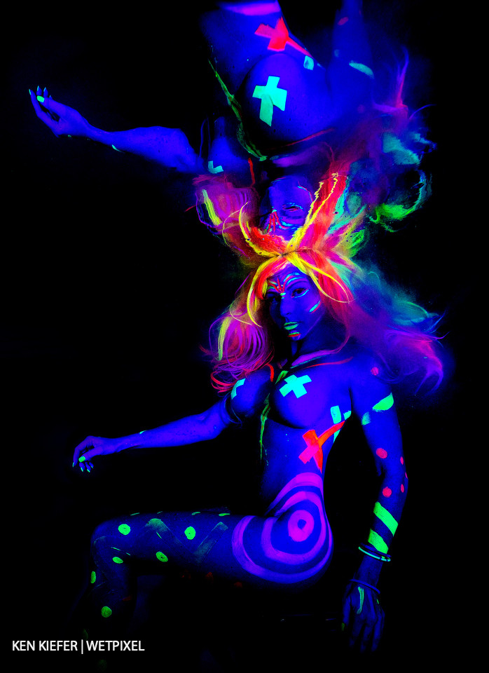 Ikelite dichroic filters over the strobes with glow paint and a black backdrop.